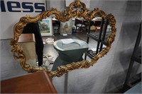 1970's ornate gold plastic mirror by