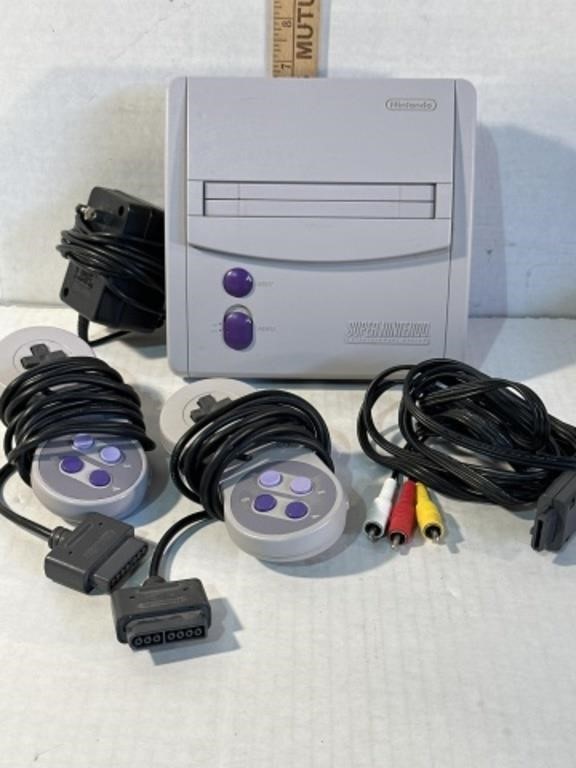 Super Nintendo Console, 2 remotes, power cord and