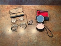 Vintage eyeglasses and compact