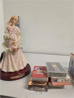 Books doll figure collectors cards as shown