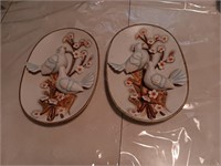 2 porcelain wall plaques 11 inches wide with
