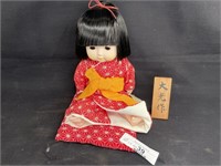 Plastic Oriental Doll
