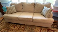 Sofa with 2 throw pillows
