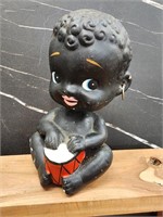 Black Americana paper mache bobble head bank with