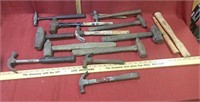 Assortment of hammers, hammer handles