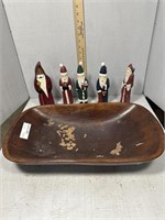 Primitive wood bowl with five wood carved Santa