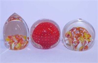 3 blown glass paperweights, one w/ controlled