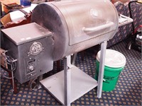 Electric Pit Boss pellet smoker, grill is 24"