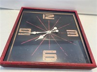 Vintage style Metal clock  measures 23“ x 23“ and