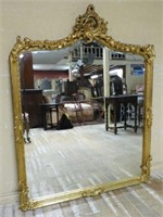 Flourish Crowned Gilt Rococo Beveled Mirror.