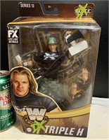 WW Triple H. wrestling figure