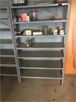 Grey metal shelf in garage 7 shelves no contents