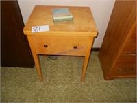 New Home sewing machine in cabinet
