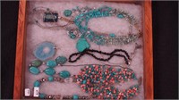 Container of mostly necklaces, some turquoise