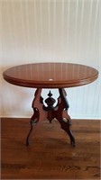 ANTIQUE OVAL PARLOUR TABLE ON CASTERS