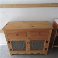 Knotty pine pie safe storage cabinet.