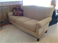 light green couch w/pillows