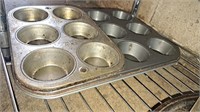 Four muffin pans