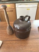 Vintage jug and wood pounder