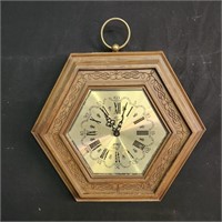 Hexagon wood-framed wall clock