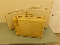 3 White Retro Suitcases