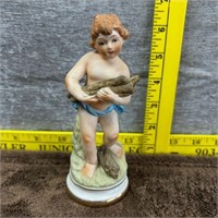 Porcelain Boy Collecting Wood Figurine