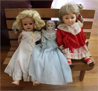 Vintage Collectible Dolls On Bench