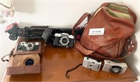 4 cameras, tripod, camera bag