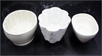 Three various early white ceramic jelly moulds