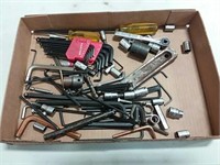 assortment of allen wrenches and sockets