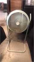 Blue vintage fan on stand
