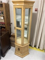 Glass and wood curio cabinet with shelves