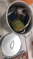 Aluminum stock pot, strainer, Tupperware bowls