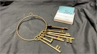 Set of old brass keys on ring