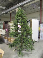 Approx. 9 ft pre-lit faux Christmas Tree w/ stand