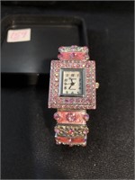 Ladies fashion wrist watch with lots of bling
