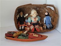 Wicker Basket With 3 Dolls and Wooden Toy Boats