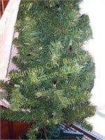 Small artificial Christmas tree with lights