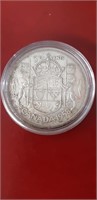 1958 Canadian Silver Half Dollar & protective case