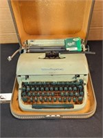 Antique Remington typewriter in case w/ extra