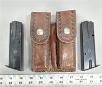 Vintage leather clip holster w/ 2 clips unknown