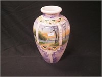 Nippon handpainted 11 1/2" vase depicting a