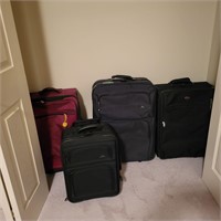 B246 Four suitcases