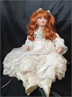 Angelique/ Rocking Chair Doll 33' Porcelain doll.