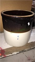 2 gallon brown and white stoneware crock with the