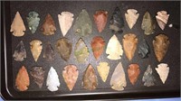 30 stone arrowheads up to 1 1/2 inches long,