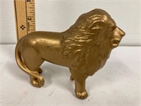 Cast iron lion piggy bank.