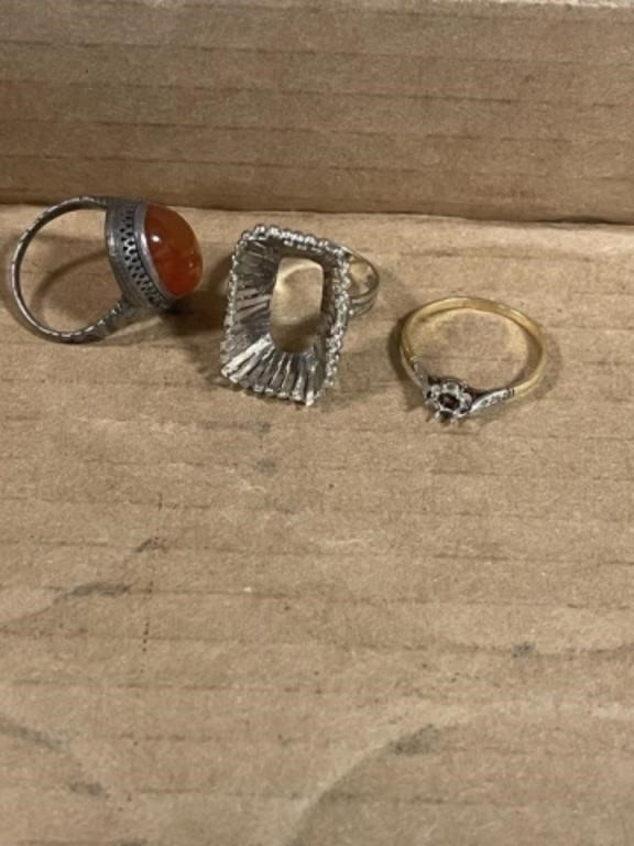 3 RINGS ALL MARKED, BUT CANT MAKE OUT MARKING