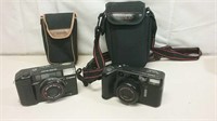 Two Cameras Blacks BX6500 & Canon Sure Shot W/