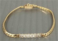 14k gold bracelet set with diamonds 6"L, 4.4 grams